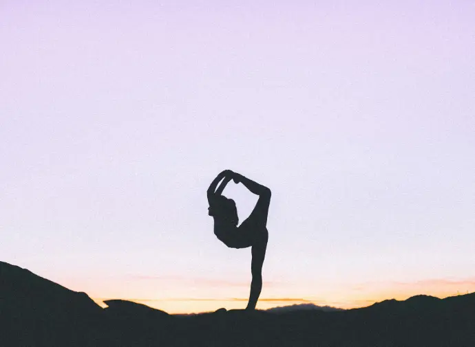 Yoga woman standing with her one leg